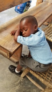 Peaceful sleeping schoolboy in Haiti.